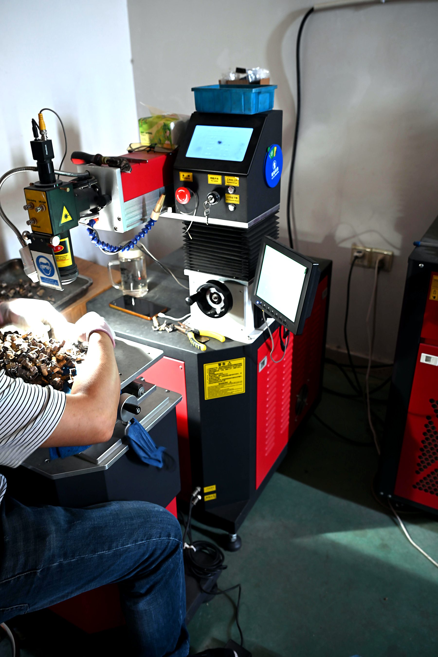 Technician performing precision assembly